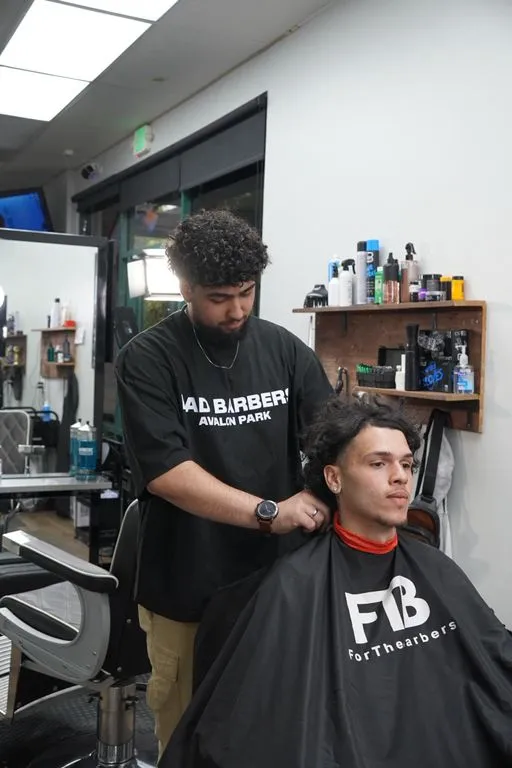 Jaeyden, barber at Mad Barbers Avalon Park