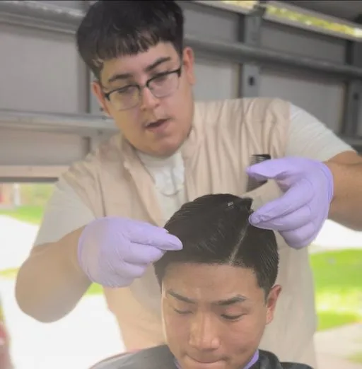 Jan R., barber at Mad Barbers Avalon Park