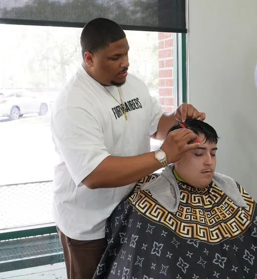 Juan S., barber at Mad Barbers Avalon Park